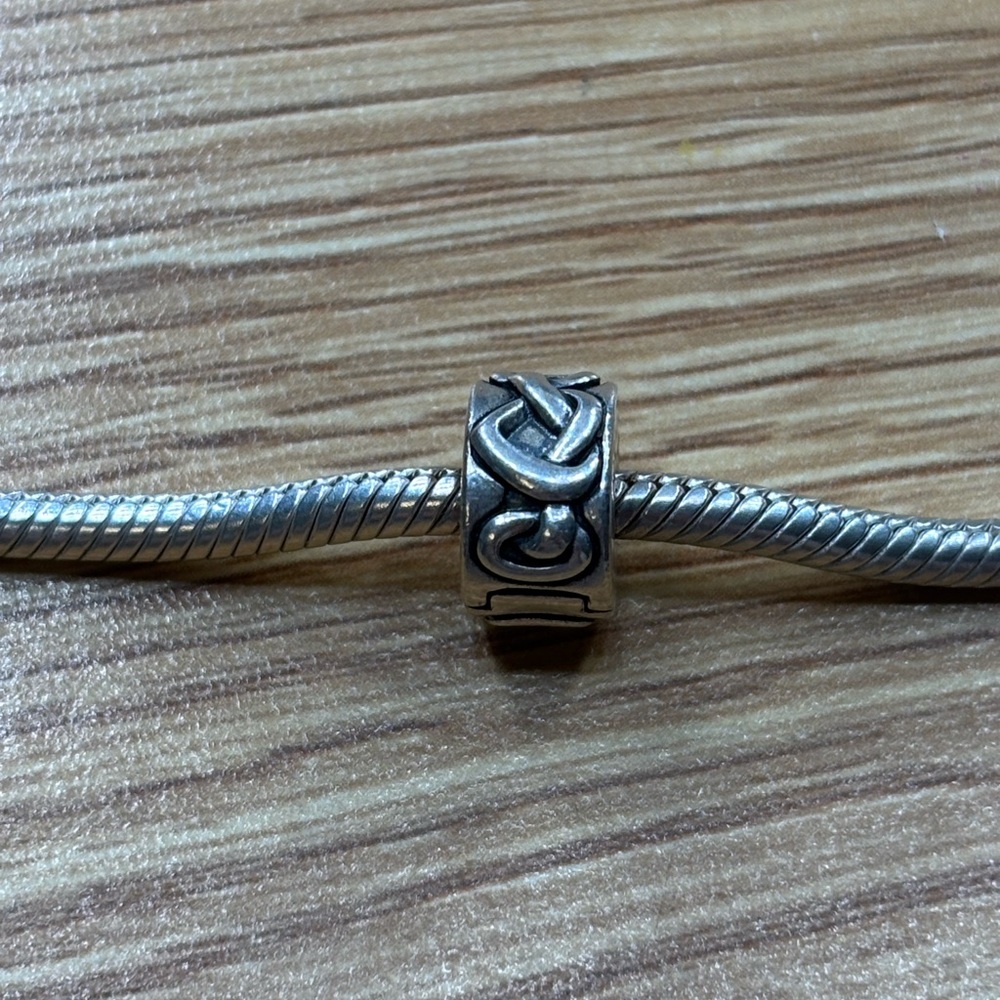 Authentic Pandora silver charm bracelet clips!